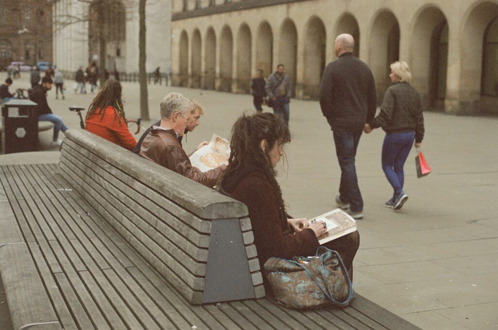 people sitting on a bench